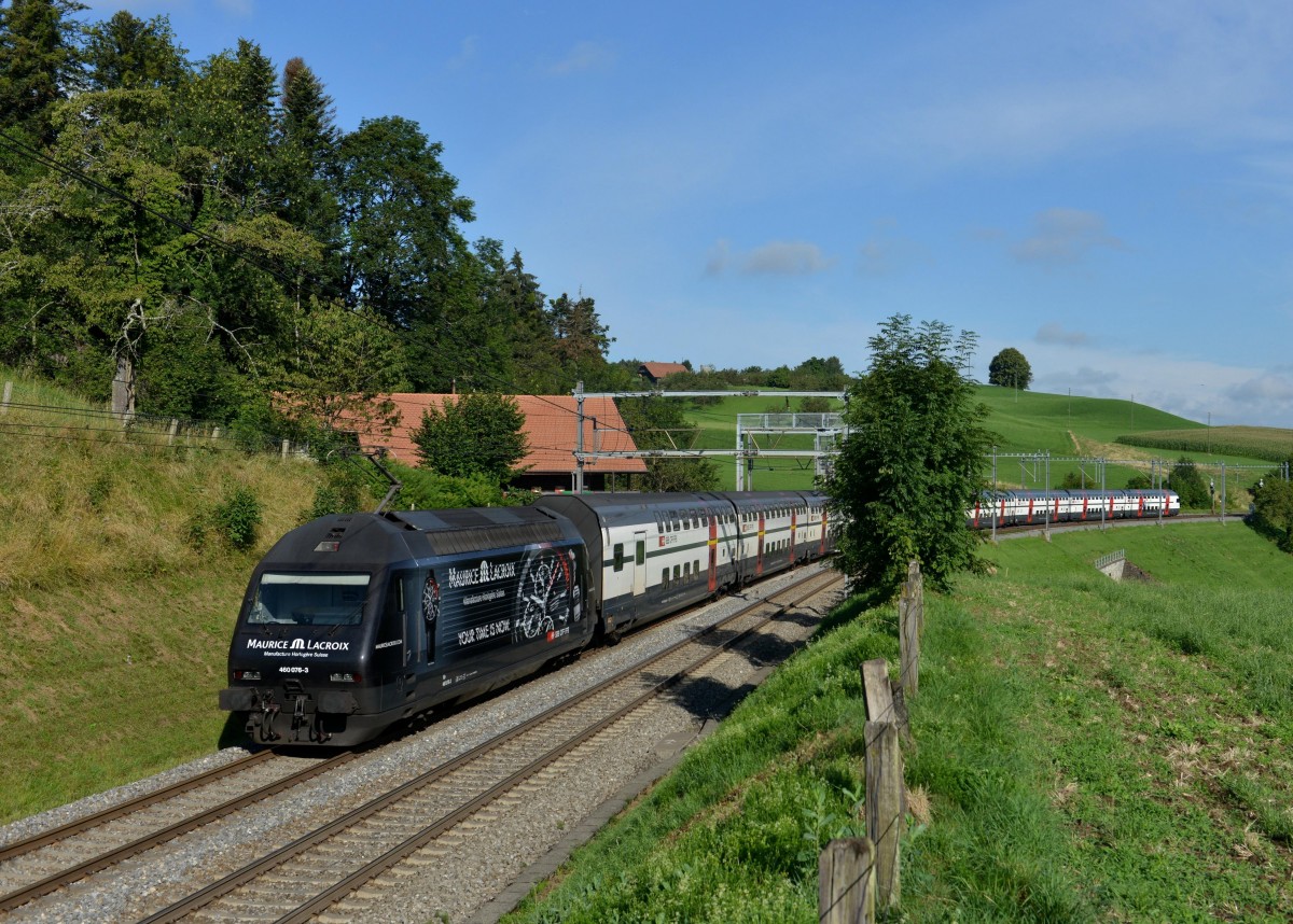 Re 460 076 mit einem IC nach Romanshorn am 26.08.2013 bei Einigen.