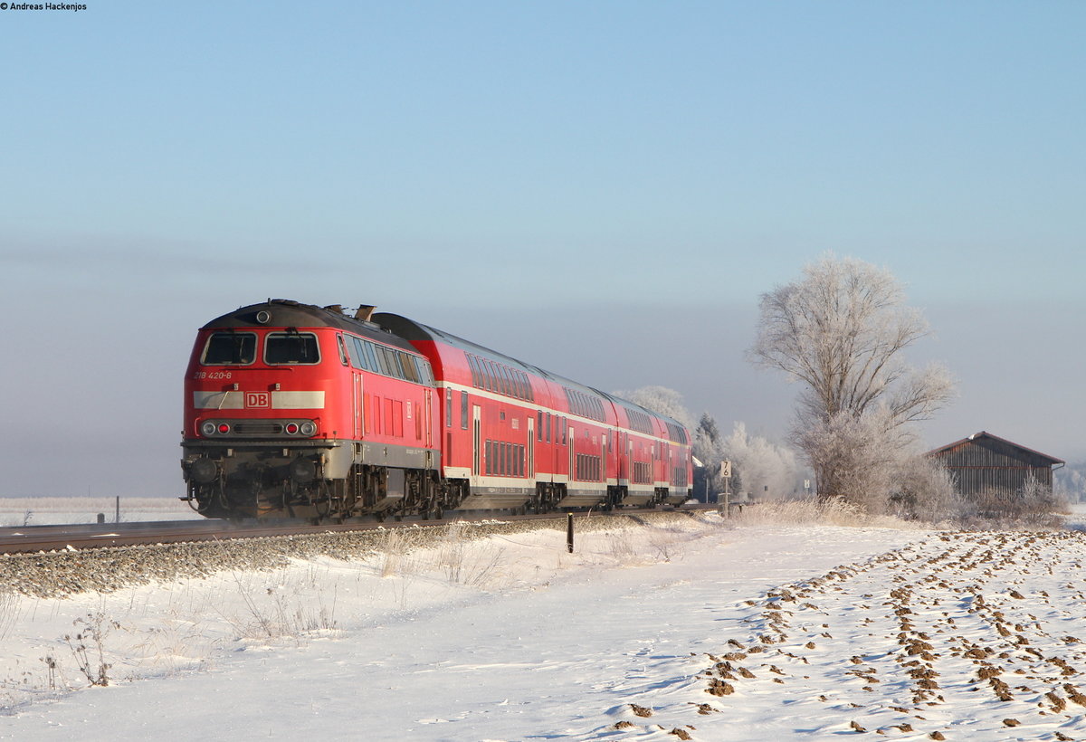 RE 57505 (Füssen-München Hbf) mit Schublok 218 420-8 bei Beckstetten 22.1.17