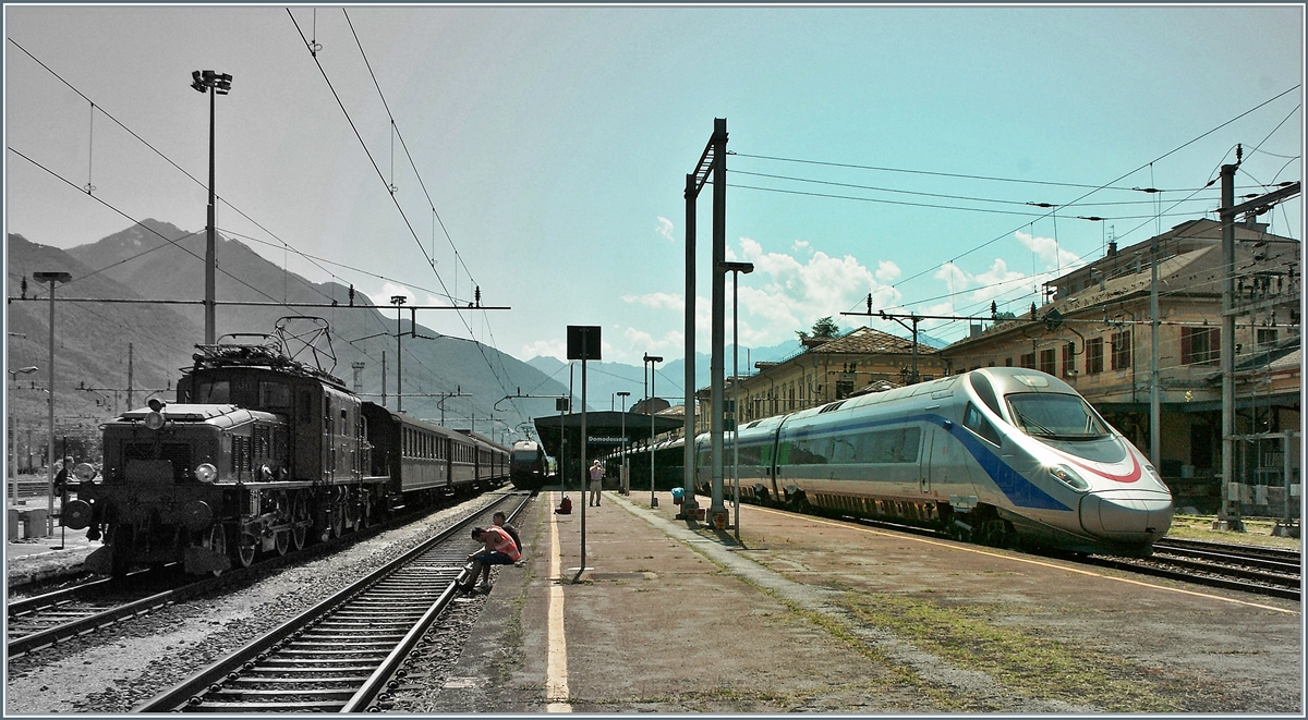 Reisezüge gestern und heute: die Ce 6/8 II 14253 mit ihrem Schnellzug  1930  und ein FS ETR 610 in Domodossola. 
20. August 2011
