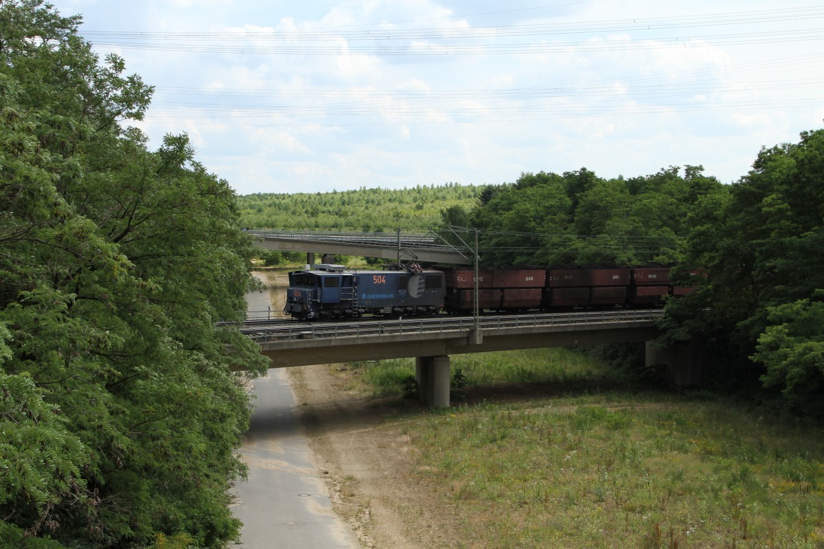 Rheinbraun 509 überquert die alte RWE Bandstraße bei Niederaussem. 26.06.14.