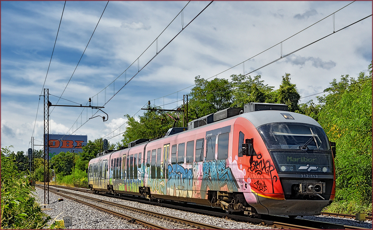 SŽ 312-113 fährt durch Maribor-Tabor Richtung Maribor HBF. /2.8.2016