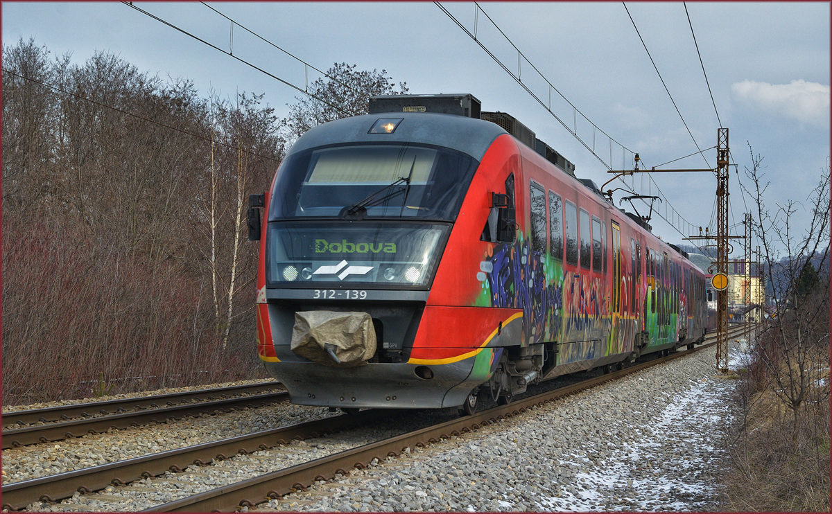 SŽ 312-139 fährt durch Maribor-Tabor Richtung Dobova. /21.3.2018
