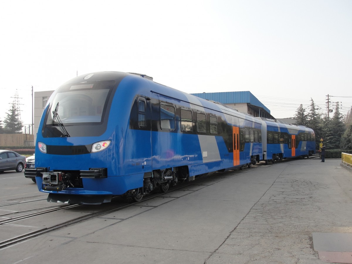 This is the Diesel Multiple Unit, manufactured by Chian CSR Puzhen vehicle company in 2011~2012, for Tunis National railway SNCFT. The photo was taken in Puzhen company during its commissioning, on 2011.12.22.
It is a 2 motor-cars train, with diesel hydrodynamic transmission technology
