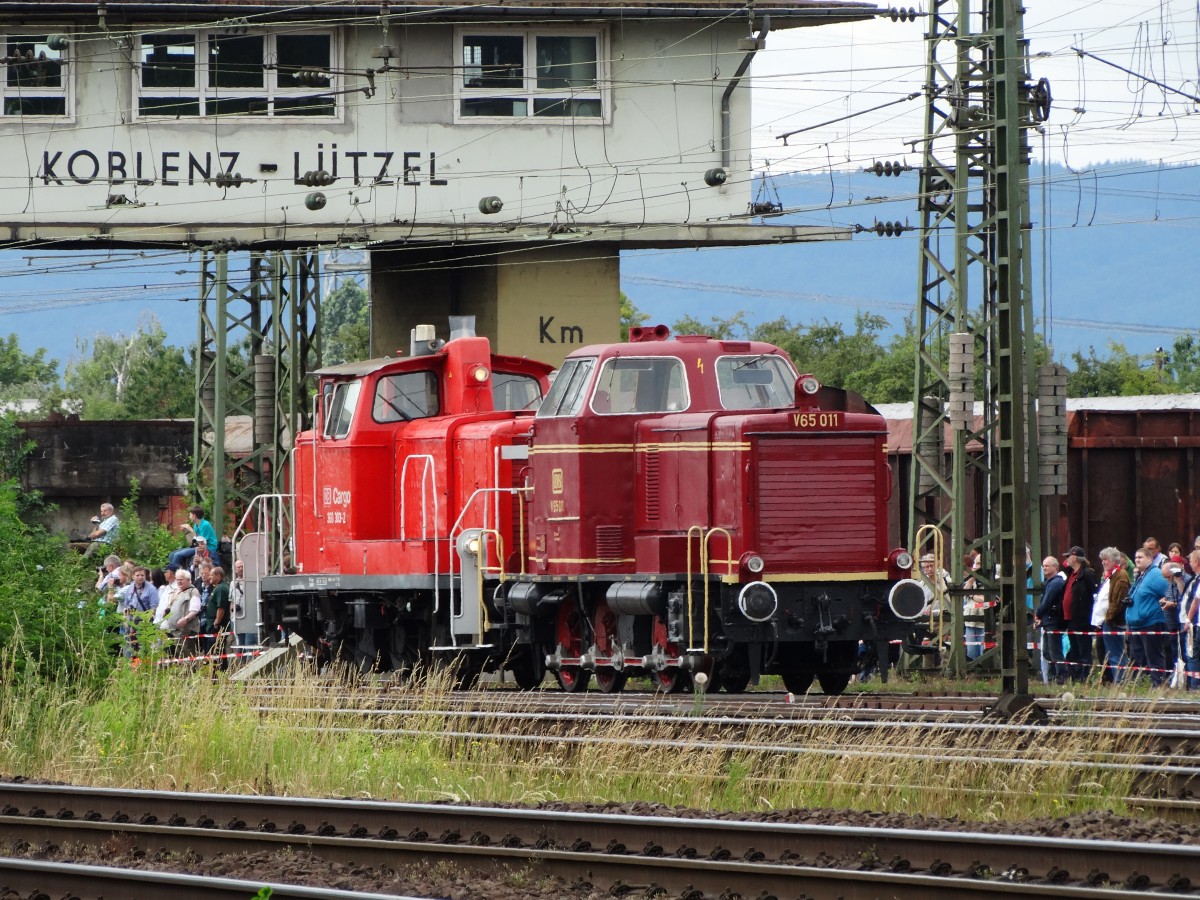 V65 011 und 360 303-2  am 14.06.14 in Koblenz Lützel von einen Öffentlichen Fotopunkt aus Fotografiert