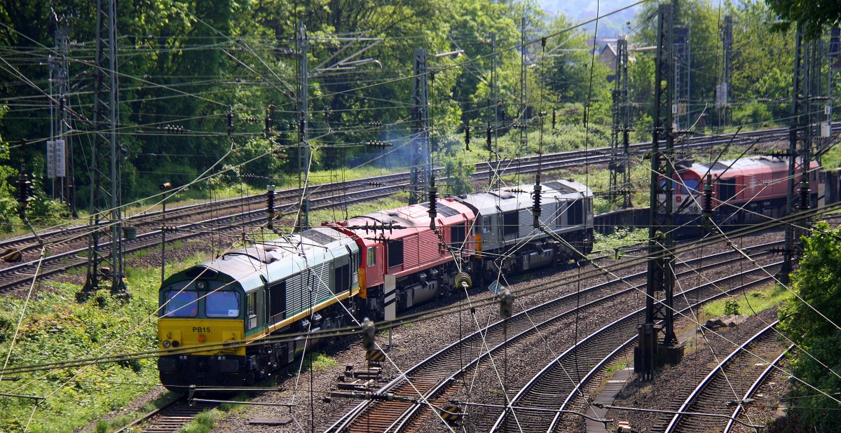 Vier Class 66 PB15,DE6313 der Lokführer startet den Motor in Aachen-West DE6307,DE6314  Hanna  alle vier von Crossrail stehen mit Licht aus auf dem Abstellgleis in Aachen-West. Aufgenommen von der Brücke der Turmstraße in Aachen bei schönem Frühlingswetter am Mittag vom 4.5.2014.