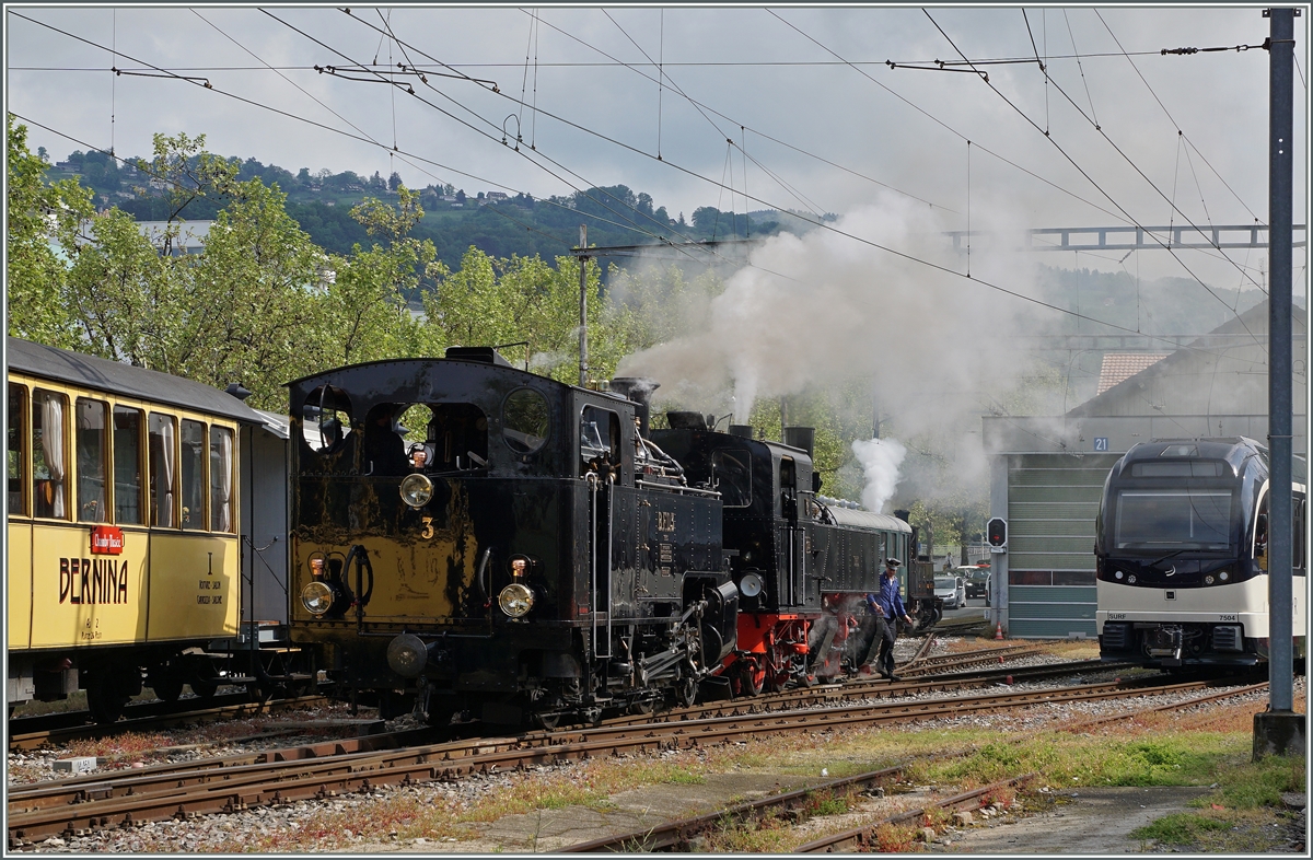 Zum Schweizer Dampffestival bei der Blonay Chamby Bahn wird in Vevey kräftig gedampft: Im Vordergrund die BFD HG 3/4 N°6 mit der SEG G 2x 2/2 105, im Hintergrund die BAM G 3/3 N° 6.
beim  Kaisermanöver  für den Riviera Bell Epoque Zug nach Chamby.
14. Mai 2016