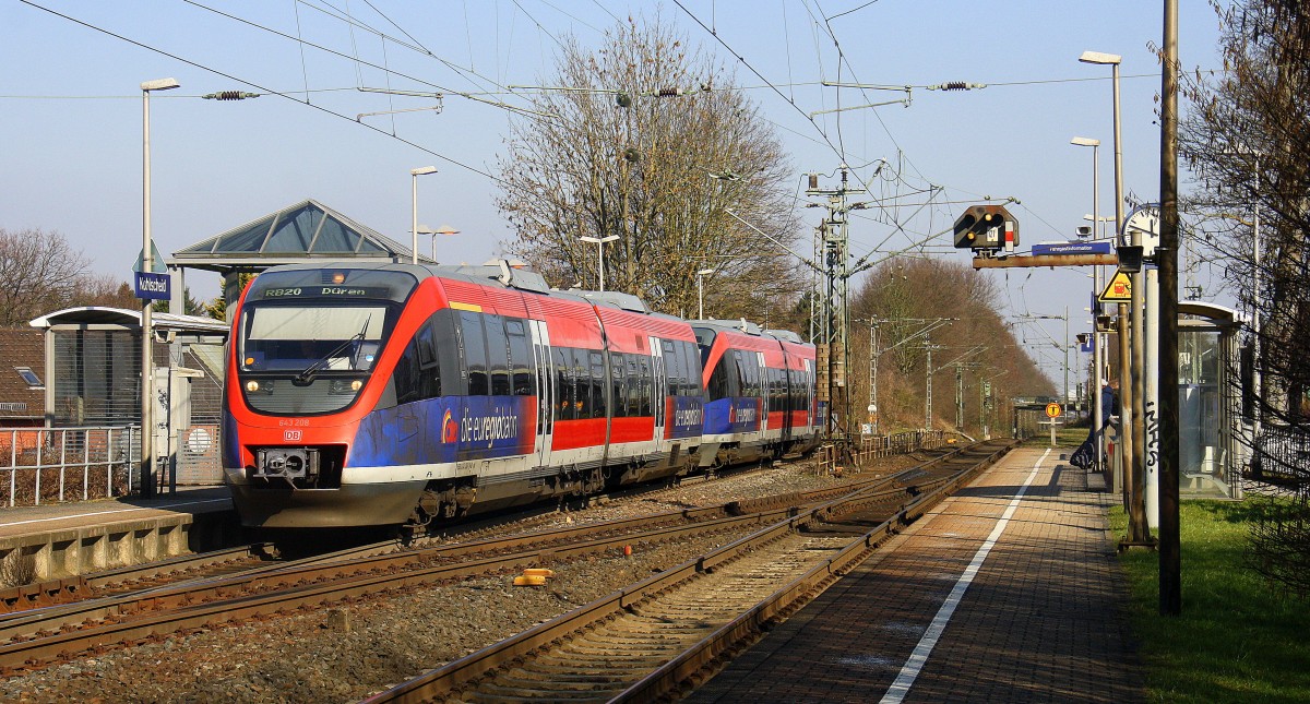 Zwei Euregiobahn (RB20) aus Eschweiler-Sankt-Jöris nach Düren-Stolberg-Altstadt und kommen die Kohlscheider-Rampe hoch aus Richtung Herzogenrath und halten in Kohlscheid und fahren in Richtung Richterich,Laurensberg,Aachen-West. 
Aufgenommen von Bahnsteig 1 in Kohlscheid. 
Bei Schönem Sonnenschein am 27.2.2016.