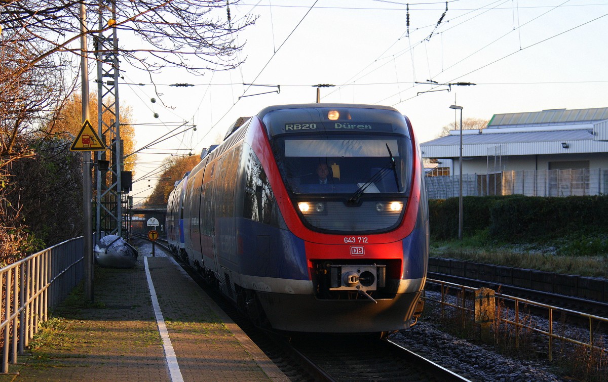 Zwei Euregiobahn (RB20) aus Heerlen(NL)-Stolberg-Hbf kommen die Kohlscheider-Rampe hoch aus Richtung Herzogenrath und halten in Kohlscheid und fahren in Richtung Richterich,Laurensberg,Aachen-West.
Bei schönem Sonnenschein am Kalten Morgen vom 27.11.2015.
