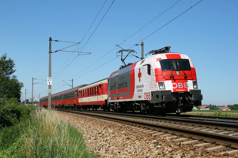 14.7.07 1116 264 bespannt den ER 2119 von Ceske Budejovice nach Wien Franz Josefs Bahnhof hier zwischen Langenlebarn und Muckendorf Wipfing.