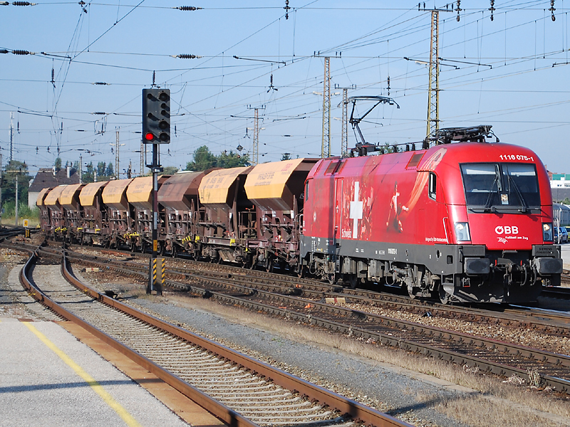 1116 075 EM-Switzerland goes on the sunny morning of 09/09/2009