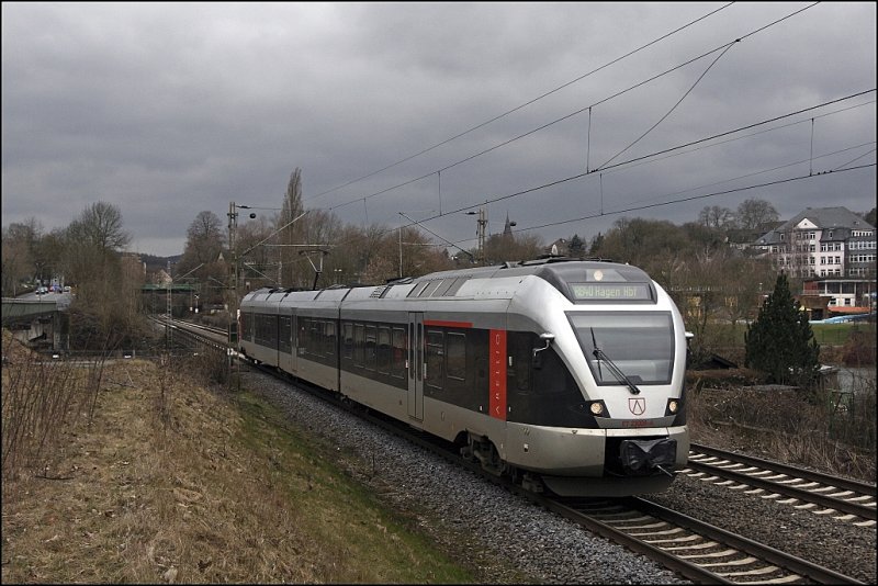 ET23009 "Siegen-Wittgenstein" than RB40 "Ruhr-Lenne-Bahn" in Hagen Hbf unterwges. (28.03.2009)
