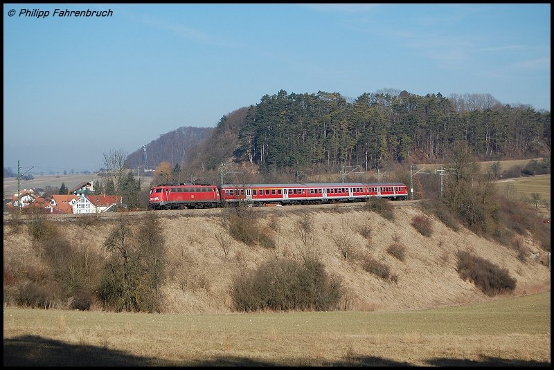 110 446-2 schiebt zur Mittagszeit des 12.02.08 RB 37155 von
