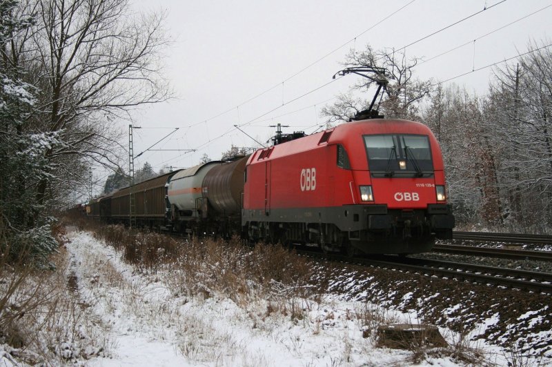 1116 129 with a mixed freight train on 13.12.2008 in