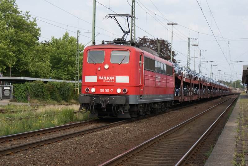 151161-7 with a car transport train while crossing the Wunstorfer