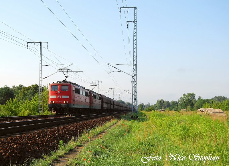151 166-6 & 151 091-6 passieren mit ihrem leeren Erzzug