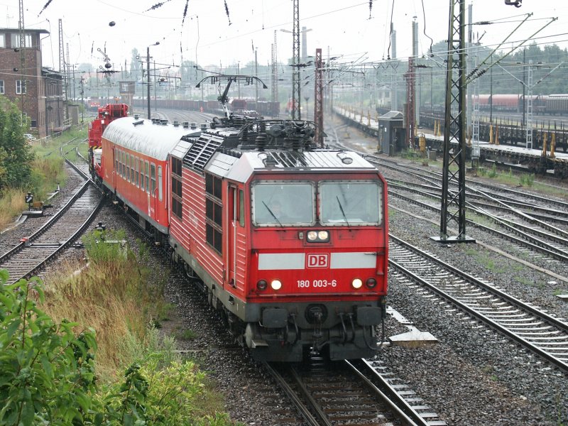 180003-6 back with a Kranzug to Leipzig on the rainy