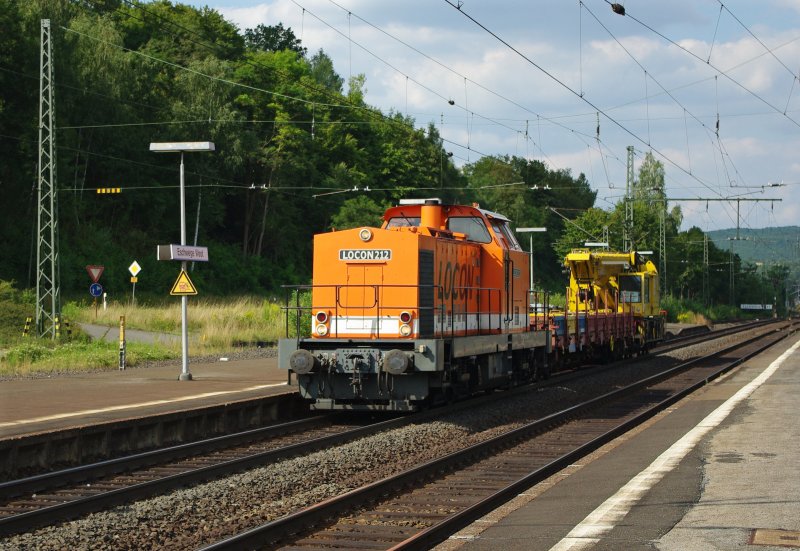 Locon 212 with construction train in the direction of south