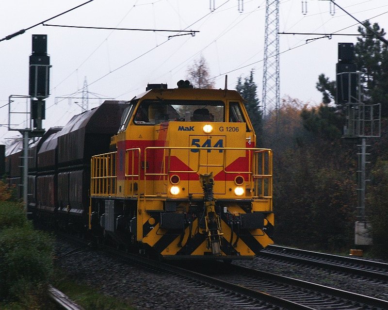 Trains run in bad weather. This locomotive pulling a freight