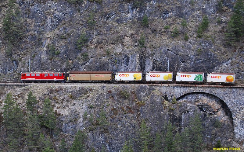 RhB Ge6/6 704 hauling a freight train on the Albula