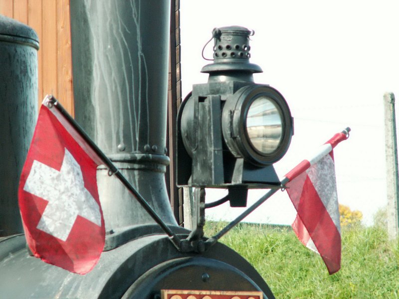 Verein Rhein-Schauen.Loklampe der Maffei Lok 200-90 Liesl 
Die beiden L�nderfahnen h�tten