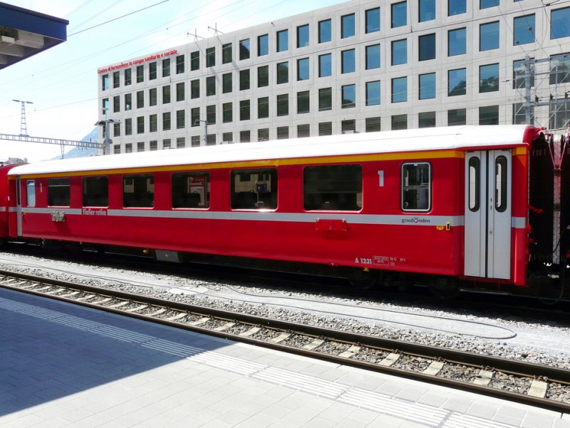 RhB - Cars 1 class A 1231 in the station