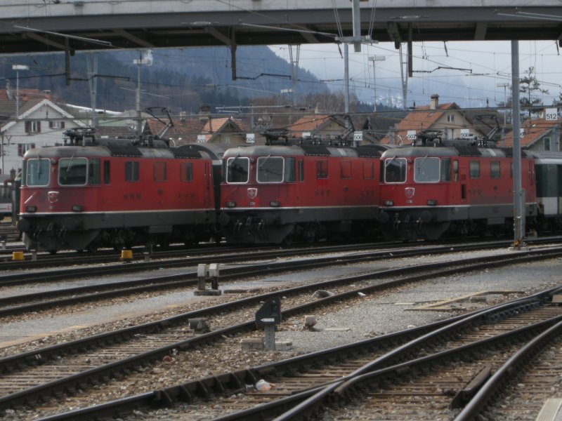 Three Re4/4II stand side by side on 02.08.2009 in Chur.