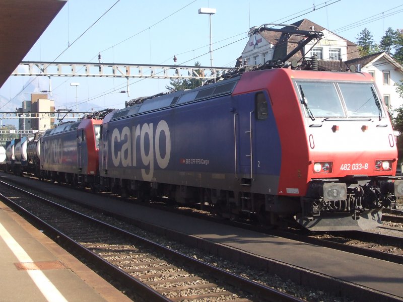Two Re 482 waiting at the station type Goldau on