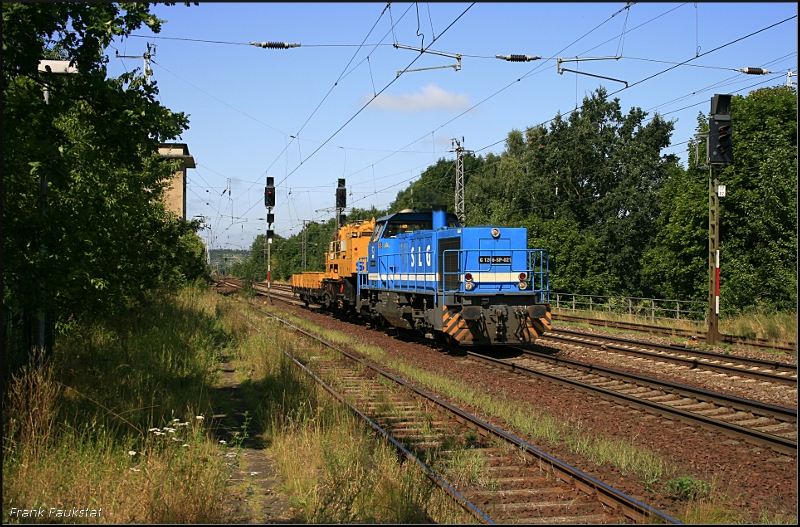 SLG G1206-SP-021 mit Bauzug Richtung Genshagener Heide. Retoure mit Niederbordwagen (Saarmund, 05.08.2009)