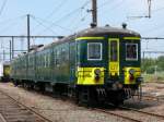 175 Jahre Eisenbahn in Belgien 175 Jahre Eisenbahn in Belgien. Zu diesem Anlass hatte der PFT(Patrimoine F�rroviaire et Tourisme) am Wochenende vom 26/27. Juni 2010 im Bahnhof von Saint Ghislain eine grosse Ausstellung von historischem Material organisiert. Triebzug 027 (Serie AM 50), von der SNCB/NMBS konserviert, geh�rte auch zu den Ausstellungsst�cken. Diese Triebz�ge fuhren nur auf den Linien Antwerpen - Br�ssel - Charleroi und Antwerpen - Essen, da sie nur Bahnh�fe mit hohen Bahnsteigen bedienen konnten.