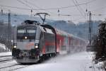 1x16-werbeloks Railjet Prototyp 1016 035 mit einem REX nach Amstetten bei der Einfahrt auf dem 'falschen' Gleis in Tullnerbach-Pressbaum. (12.2.2010)
