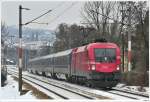 1x16-werbeloks Im Wiener Raum leben wir im Winter leider immer unter einer hartn�ckigen Nebelsuppe. Trotzdem trieb es mich heute mit meiner Kamera wieder mal raus, um die 1116.003 abzulichten, welche den EN467 (Wiener Walzer) von Wien nach Budapest bespannte. Wien/Hietzing, 14.02.2010.