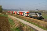 1016 034 im Railjet Vordesign f�hrt mit einer Dostogarnitur als ...