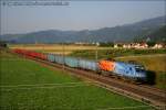 1x16-werbeloks 1116.250 'Feuerwehr' mit DG 45336 auf der Fahrt von Sopron nach Villach, nahe der Ortschaft St. Magarethen b. Knittelfeld, 22.07.2010