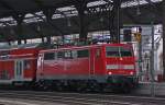 111 117 mit dem RE10422 aus Dortmund bei der Einfahrt ...