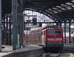 aachen 111 012 steht mit dem RE4870 aus Siegen gerade angekommen in Aachen Hbf am Bahnsteig, 24.7.10