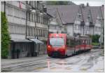AB Appenzeller Bahnen In Teufen konnte die ehemalige SGA ihren Strassenbahncharakter noch etwas bewahren, wobei der Niederflursteuerwagen ABt 121 etwas bedrohlich wirkt vor den typischen Appenzeller H�usern. (28.07.2010)