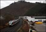 Abellio Rail NRW ET23003 erreicht als RE16 'Ruhr-Sieg-Express', Siegen - Essen HBF, Altenhundem. (06.12.2009)