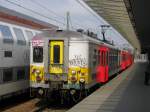 Triebzug 702 in Brugge am 14.-4-2010  ...