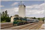auslandische-zuge 664 119 mit ihrem SE 19194 am 25.6.2010 bei der Durchfahrt in V�lkermarkt-K�hnsdorf. 