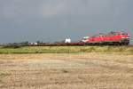 Die 218 345-7 zieht ...  Eric Otten 25.08.2011