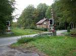 Die Kreisstra�e Bergen/R�gen-Putbus �berquert am ehmaligen Haltepunkt Pastitz die Bahnstrecke ...