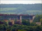 Ein Gterzug berquert gerade das Ghltal bei Moresnet auf der lngsten Eisenbahn  stahlbrcke Europas ,im Herzen des Dreilnderecks D,B,NL.