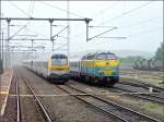 bersicht auf den Bahnhof von Gouvy fotografiert am 18.05.08: Neben der  composition dromadaire  (Lok BR 13 mit I 11 Wagen) steht die Diesellok 5529 und rechts im Bild sind 4 Loks der Srie 82 zu