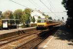 NMBS 1190 mit IC 2462 Amsterdam CS-Brussel Zuid Midi auf Bahnhof Zevenbergen am 14-10-1996. Bild und scan: Date Jan de Vries.