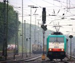 Die Cobra 2822 kommt aus Richtung Herzogenrath als Lokzug aus Duisburg-Rheinhausen und fhrt in Aachen-West bei Regenwetter am 5.7.2012.