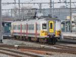 L-Zug aus Kortrijk erreicht sein Ziel (Bhf Brugge). Triebzug der Baureihe AM 78 Nr. 754 am 29. Januar 2014.