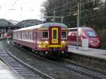 Zwei Belgier im Hbf Aachen. Links auf Gleis 8 Triebzug 164 der Baureihe AM62 startet in Richtung Mttich. Auf Gleis 9 steht der Thalys 4307, und wird in Krze weiterfahren in Richtung Kln. Aufgenommen am 05/12/2009. 