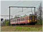 Die AM63 246 kommt am 10.04.2009 aus Richtung Brugge und wird in Krze den Bahnhof von Hansbeke erreichen.