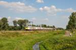 Eine Dreiergarnitur von Triebzügen der Serie AM80 (Break) mit Triebzug 387 am Zugschluss nähert sich dem Haltepunkt Schulen auf der Linie 35. Aufgenommen am 21/08/2015.