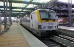 Ein Nachschuss von der SNCB 1812 steht in Oostende(B) mit einem Belgischer Doppeldecker von Oostende(B) nach Bruxelles-Nat.-Aéroport(B).
Aufegommen von Bahnsteig 9 in oostende(B).
Bei Sonnenschein am Mittag vom 28.2.2016.   